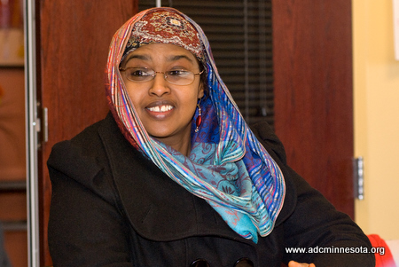 A woman with a brightly-colored hijab