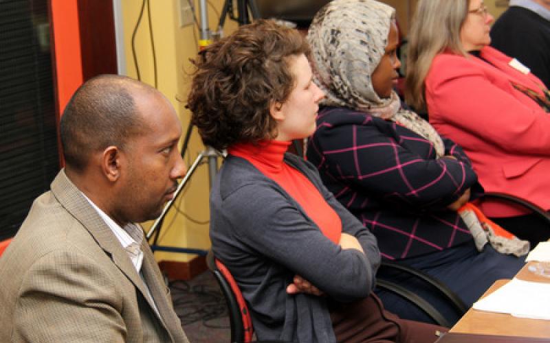 Participants listen to Police Chief of Minneapolis, Jeneé Harteau (not shown)