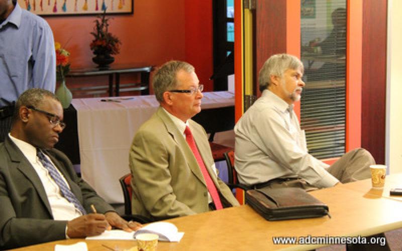 Participants listen to remarks by Jeremy Hanson Willis, Director of Community Planning and Economic Development for the City of 