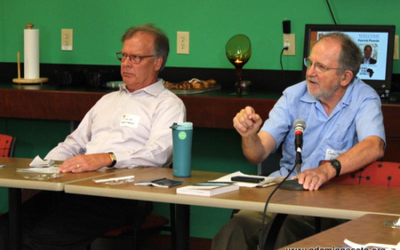 Participants listen to remarks by Patrick Plonski