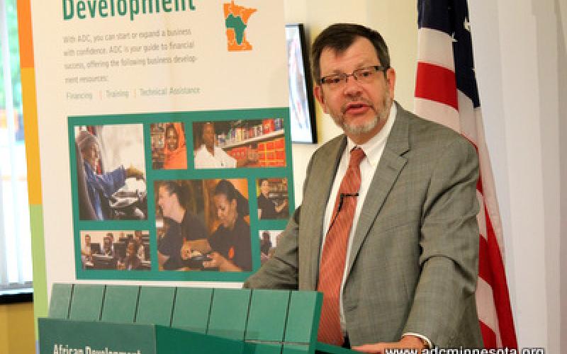 Eric W. Kaler, President of the University of Minnesota speaks at the podium