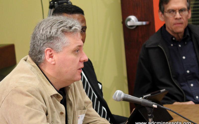 a participant speaks at the ADC Business Breakfast Roundtable February 2012