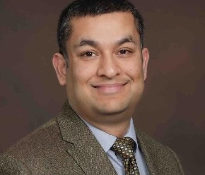 Asad Azmi is a Loan Committee Member with African Development Center, MN Headshot of Asad Azmi